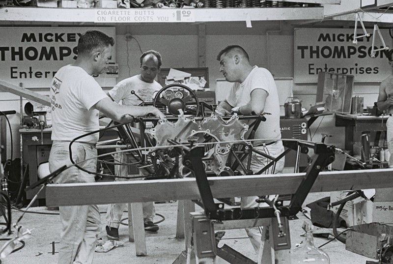 Mickey Thompson’s crew spent long hours in the Indy garage in May trying to get his racer to handle properly